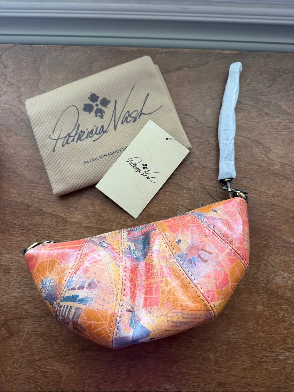 Patricia Nash Leather Croissant “Paris”Wristlet or cross body bag